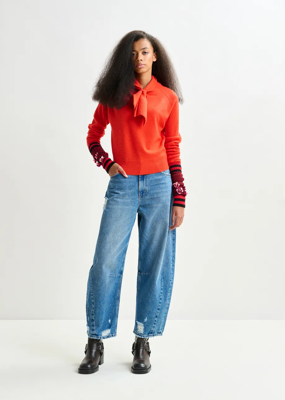 Orange cashmere sweater with pussy-bow tie