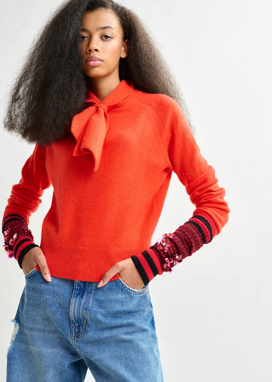 Orange cashmere sweater with pussy-bow tie
