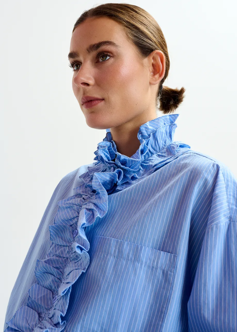 Blue and white oversized striped cotton shirt with ruffle details