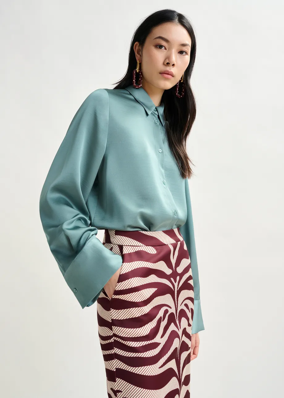 Light blue oversized satin shirt with button placket