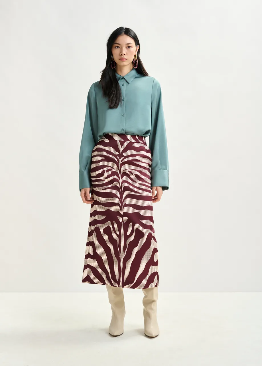 Light blue oversized satin shirt with button placket