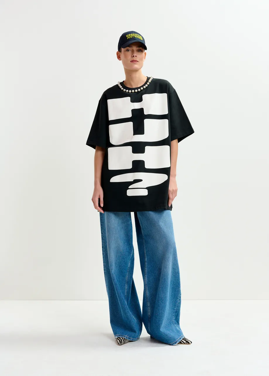 Black and white oversized cotton T-shirt with "HUH?"- print and bead embellishments