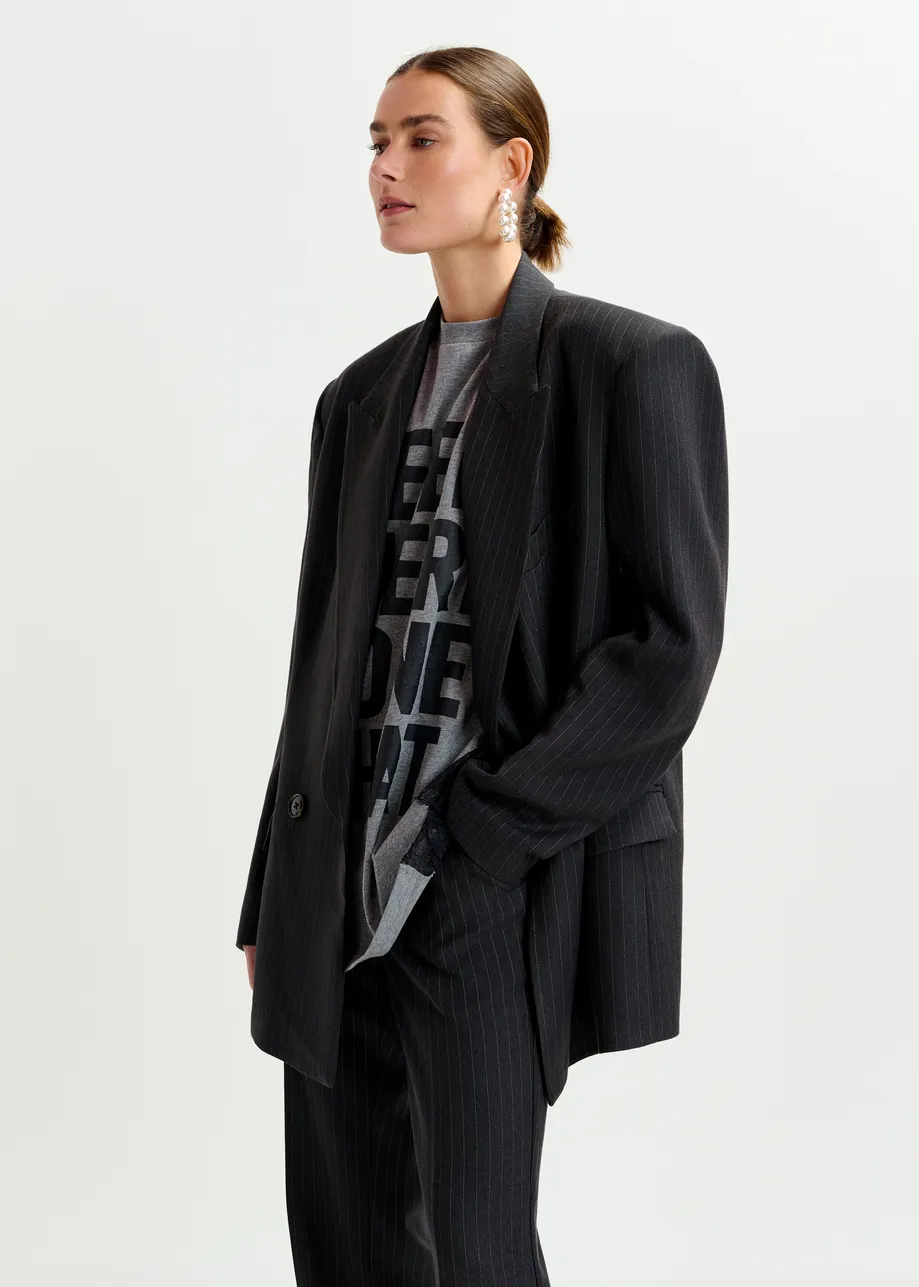 Navy and white double-breasted blazer with underarm zip detail