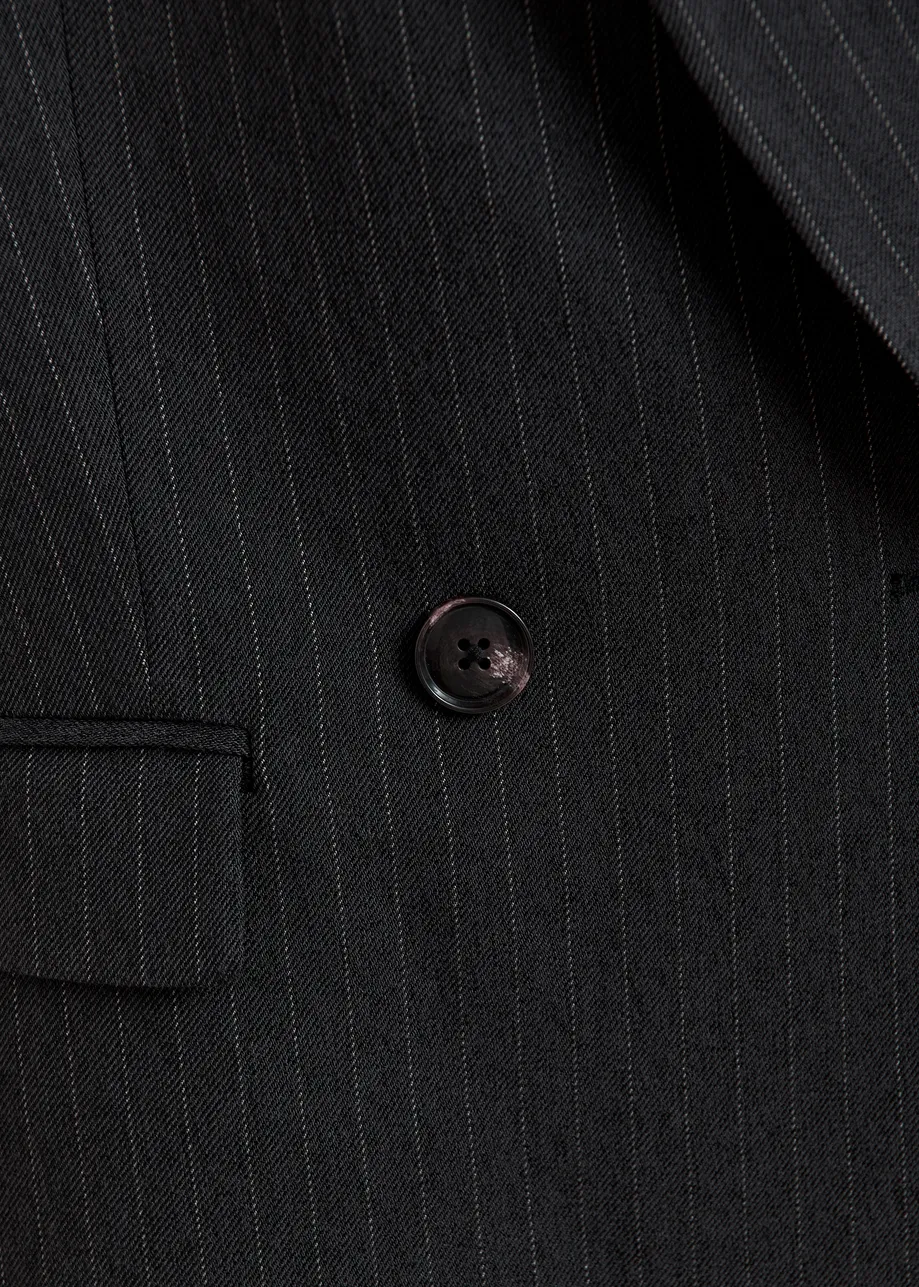 Navy and white double-breasted blazer with underarm zip detail