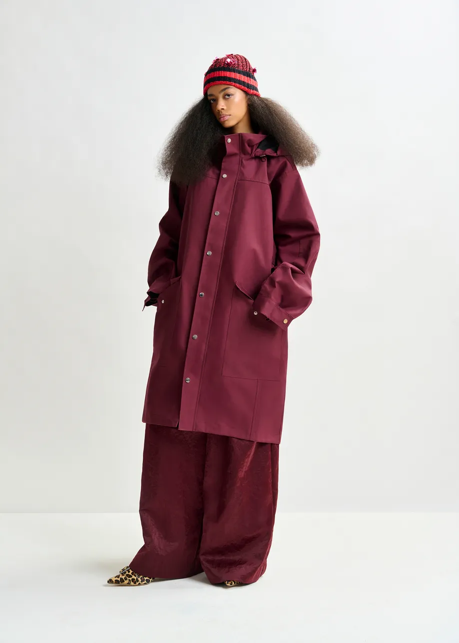 Burgundy hooded raincoat
