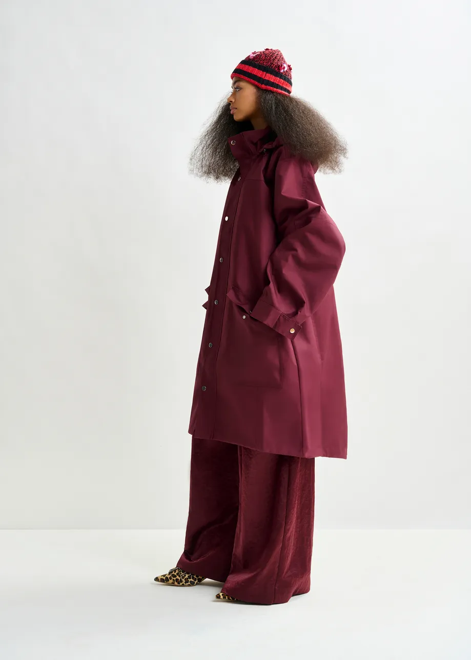 Burgundy hooded raincoat