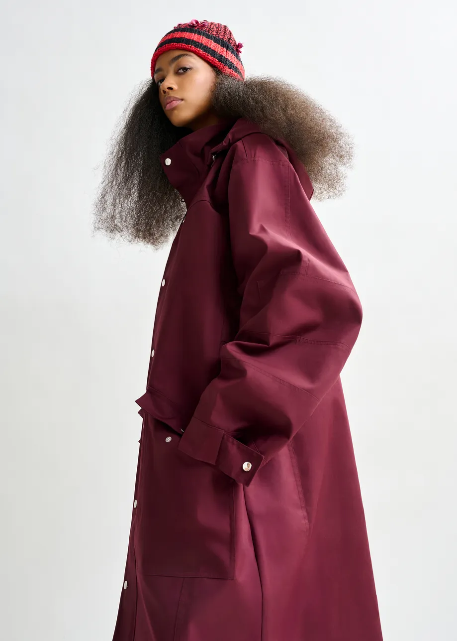 Burgundy hooded raincoat