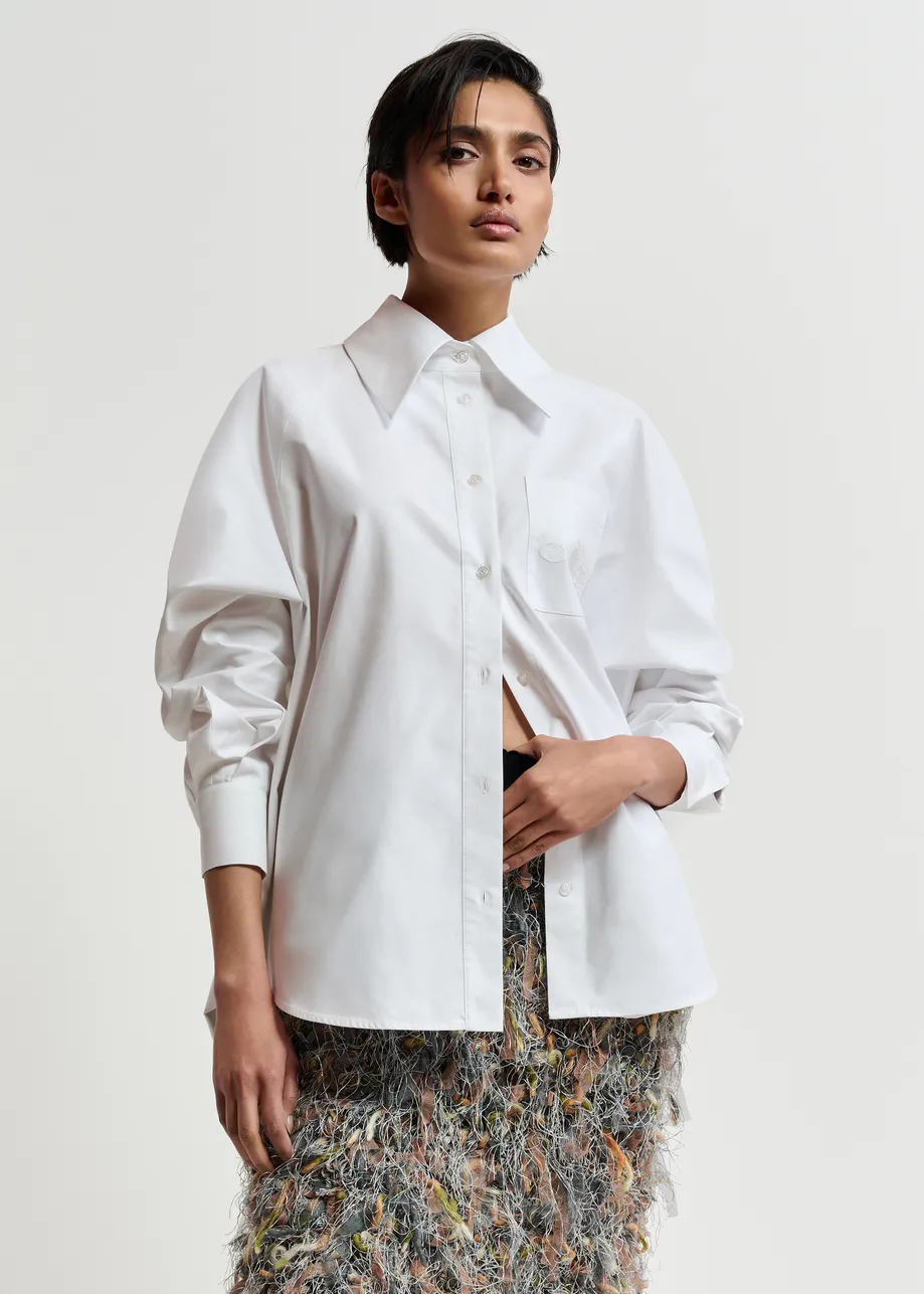 White oversized cotton shirt with draped back detail