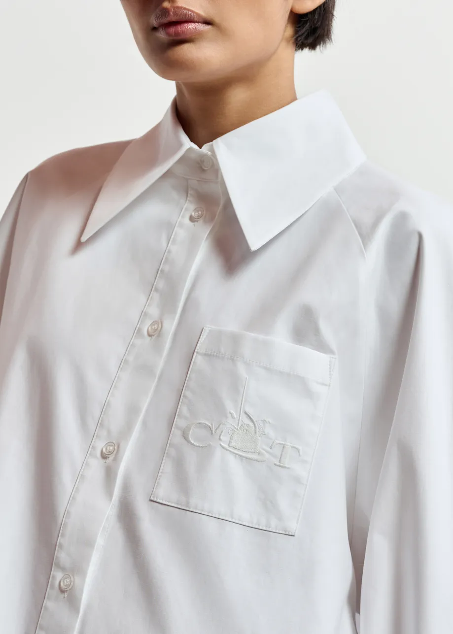 White oversized cotton shirt with draped back detail