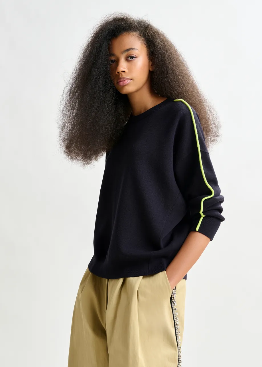Navy and green knitted sweater with fitted waist