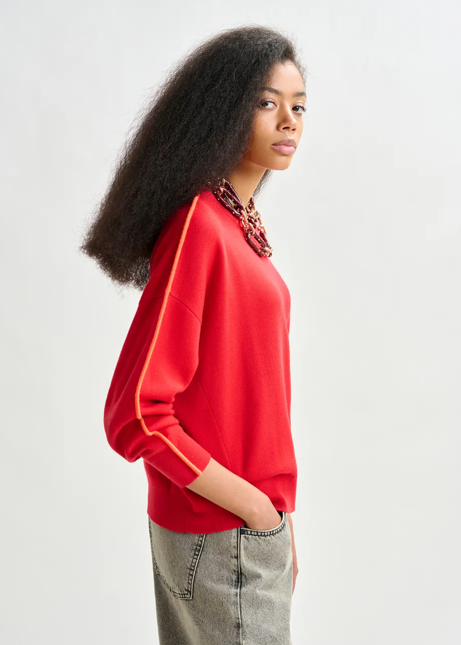 Red and orange knitted sweater with fitted waist