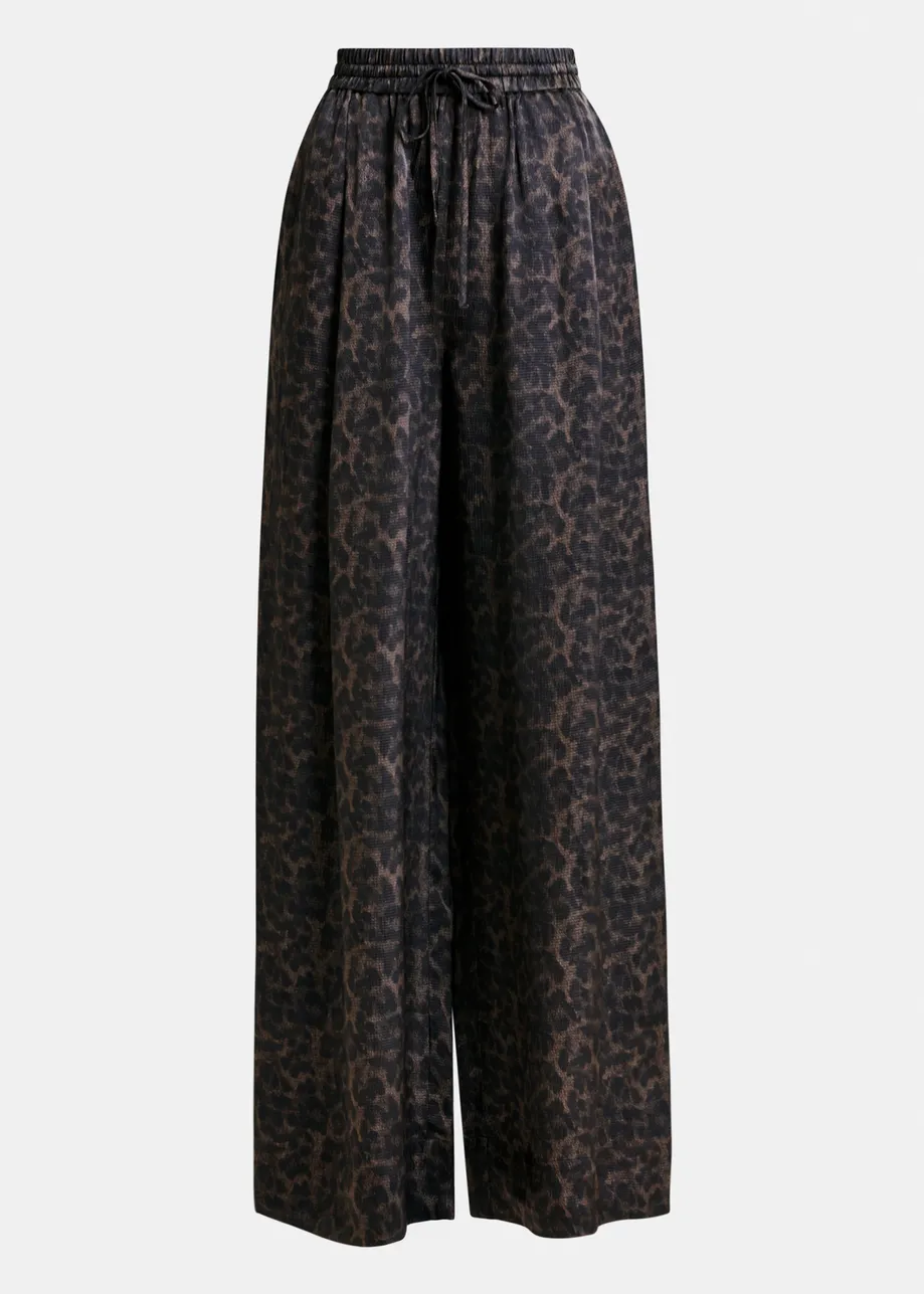 Pantaloni marroni e neri a gamba larga con stampa leopardata