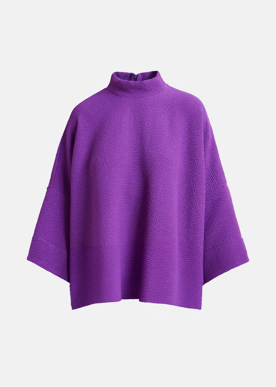 Purple oversized top with stand-up collar