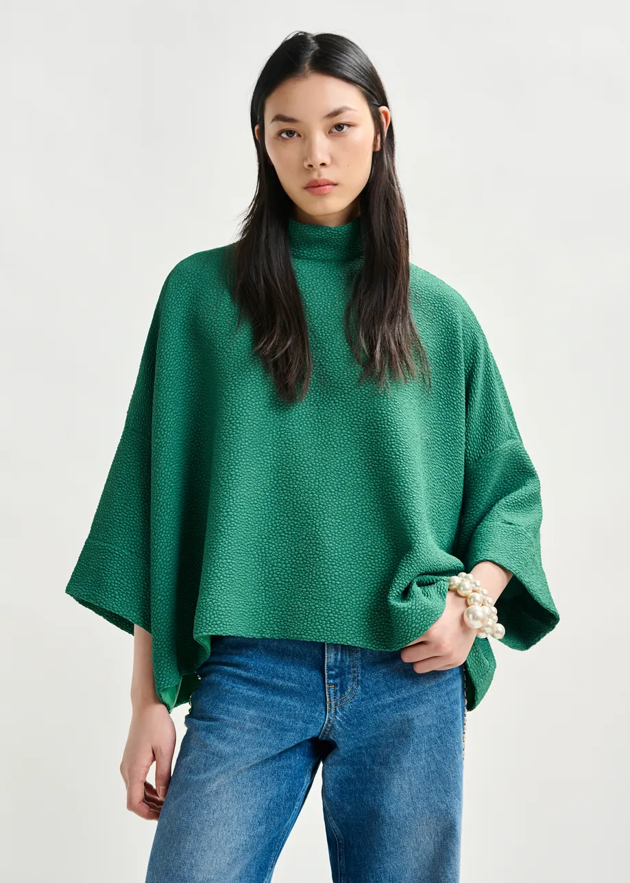 Green oversized top with stand-up collar