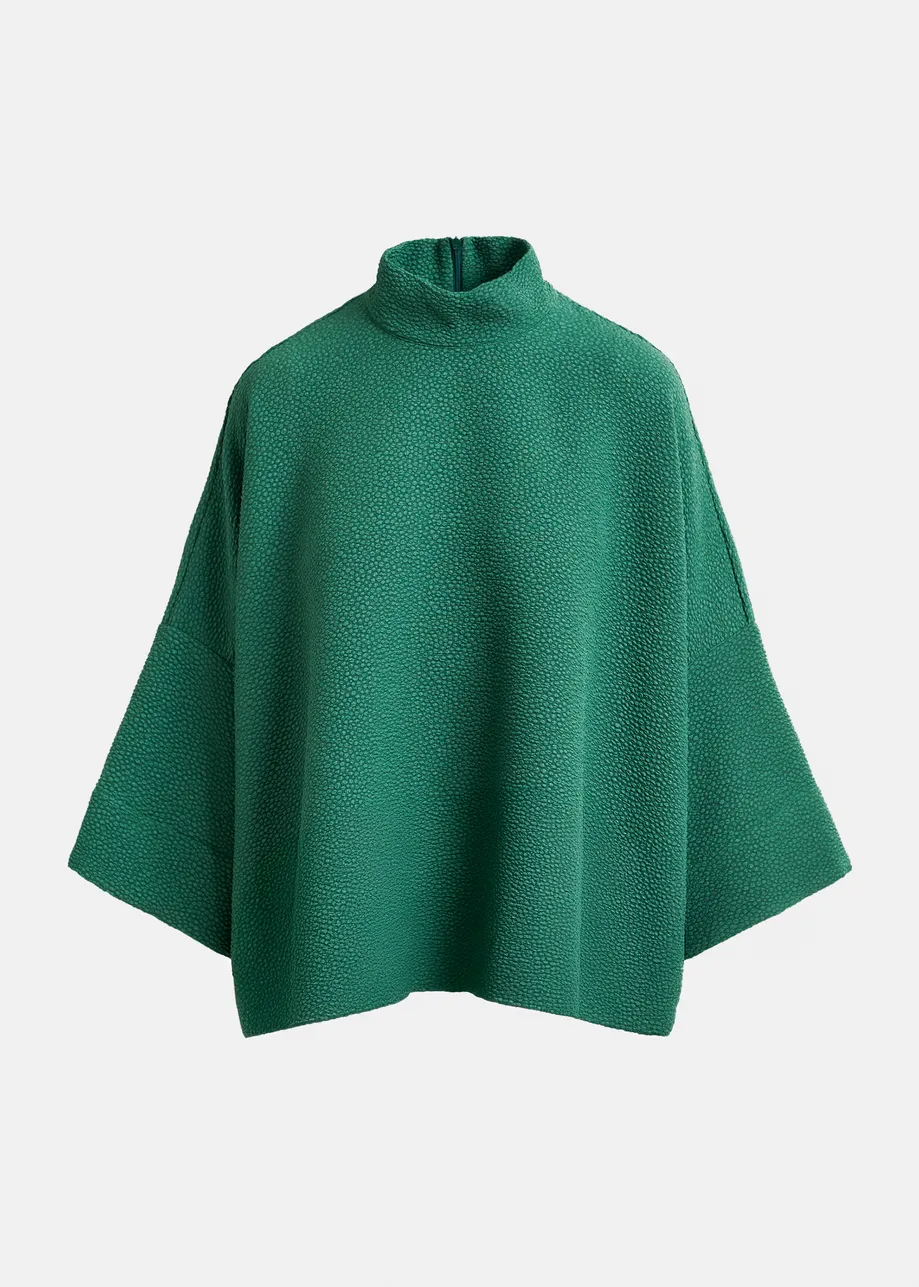 Green oversized top with stand-up collar