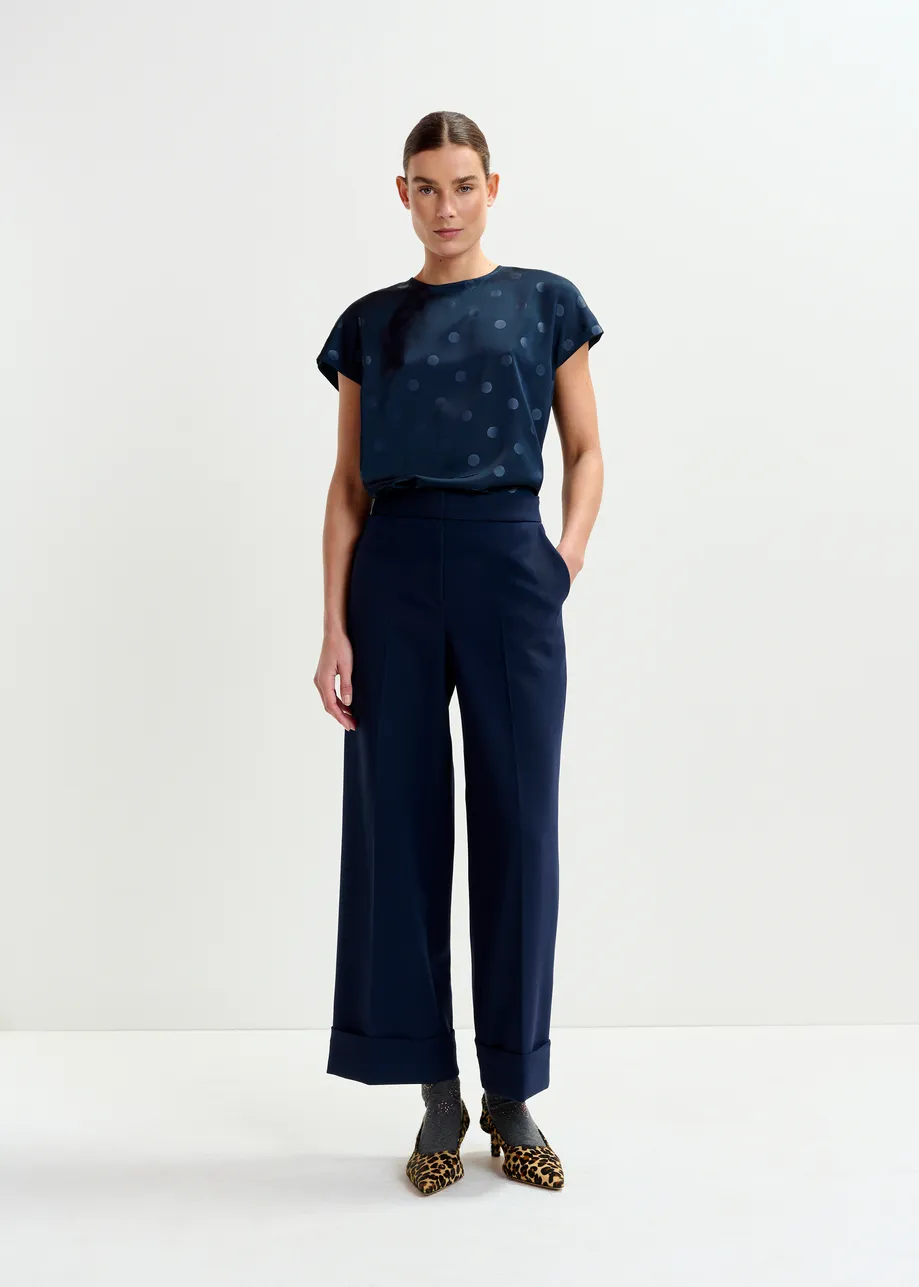 Navy polkadot top with cap sleeves