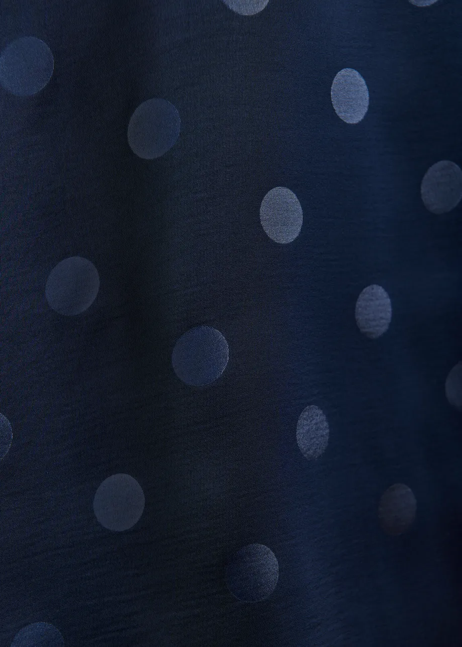 Navy polkadot top with cap sleeves