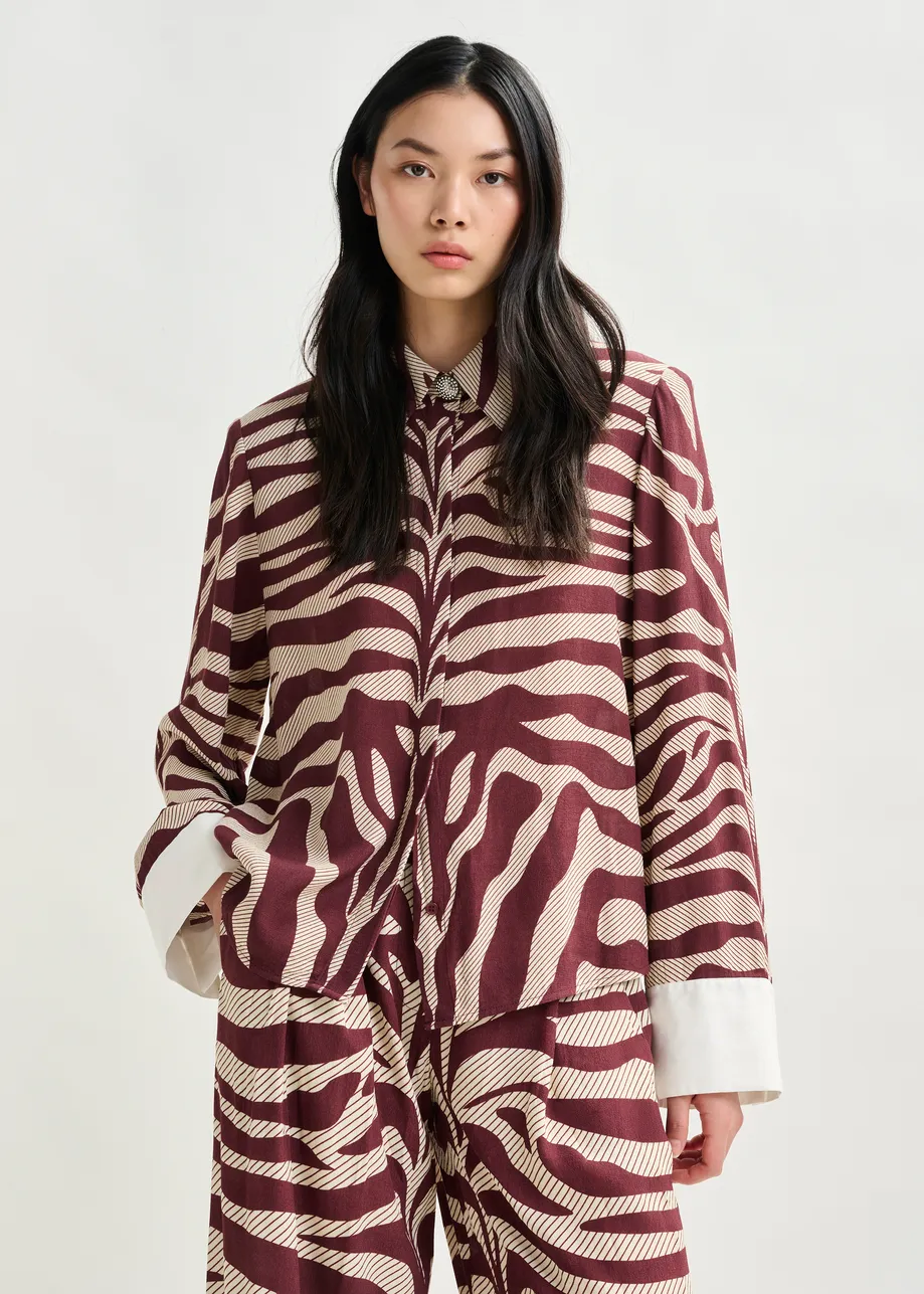 Off-white and burgundy zebra-jacquard shirt with rhinestone-encrushed button