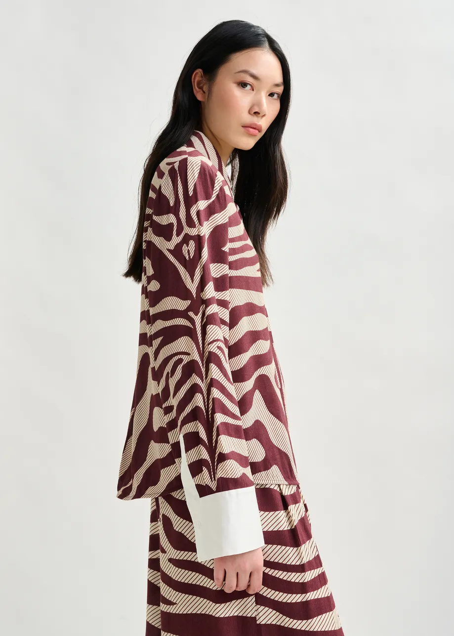 Off-white and burgundy zebra-jacquard shirt with rhinestone-encrushed button