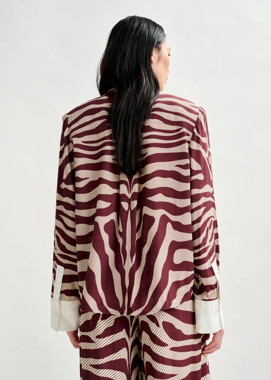 Off-white and burgundy zebra-jacquard shirt with rhinestone-encrushed button