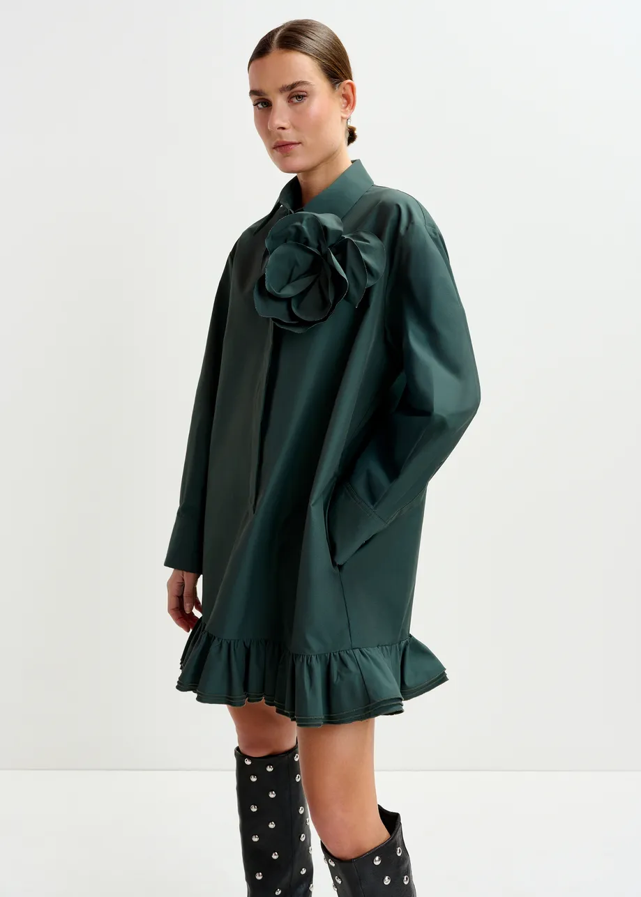 Dark teal green ruffled mini shirt dress with self-fabric flower