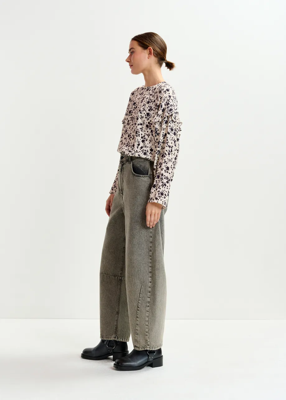Off-white and black floral top with ruffle detail