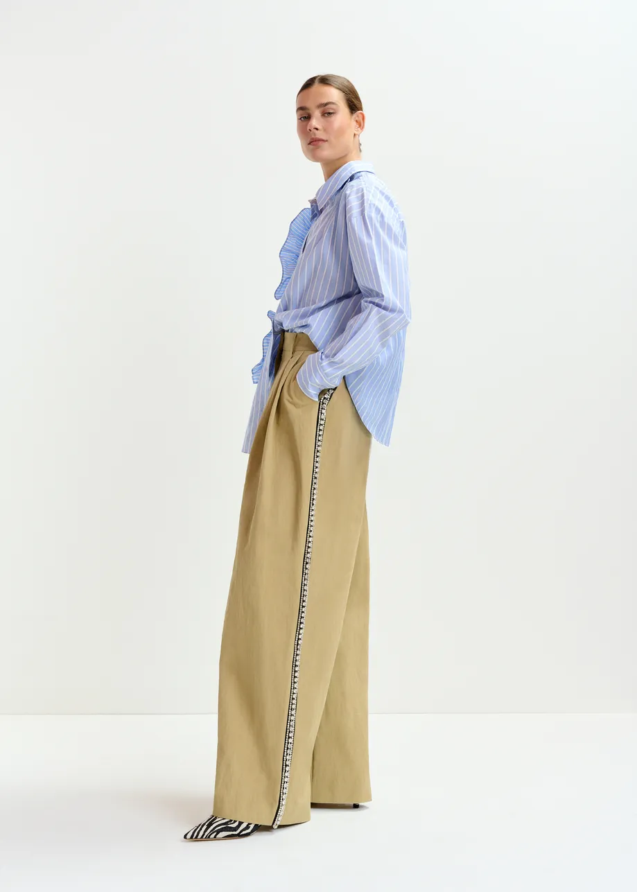 Beige rhinestone-trimmed pleated wide-leg pants