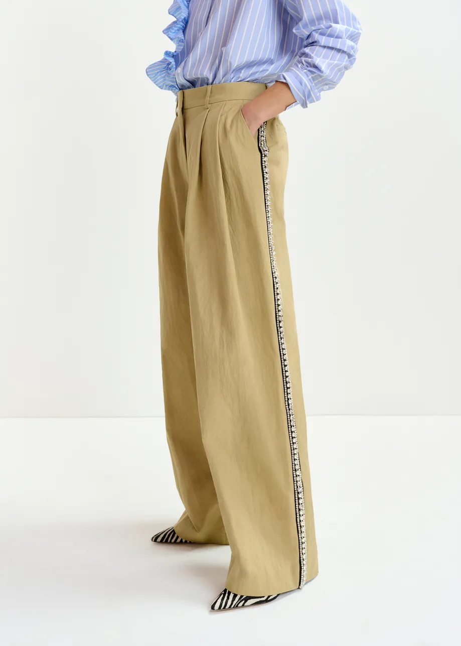 Beige rhinestone-trimmed pleated wide-leg pants