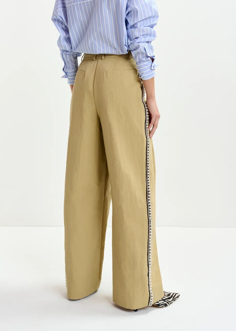 Beige rhinestone-trimmed pleated wide-leg pants