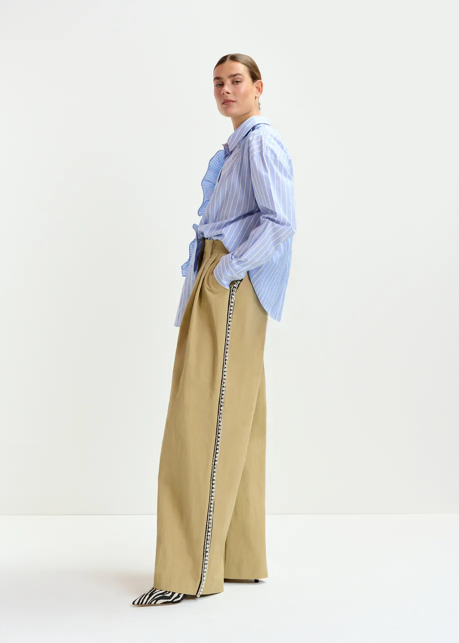Beige rhinestone-trimmed pleated wide-leg pants
