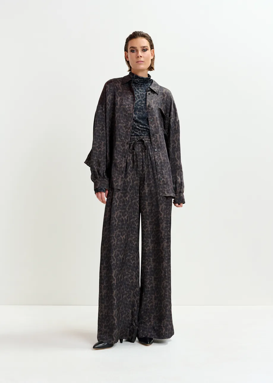 Brown and black leopard print turtleneck top