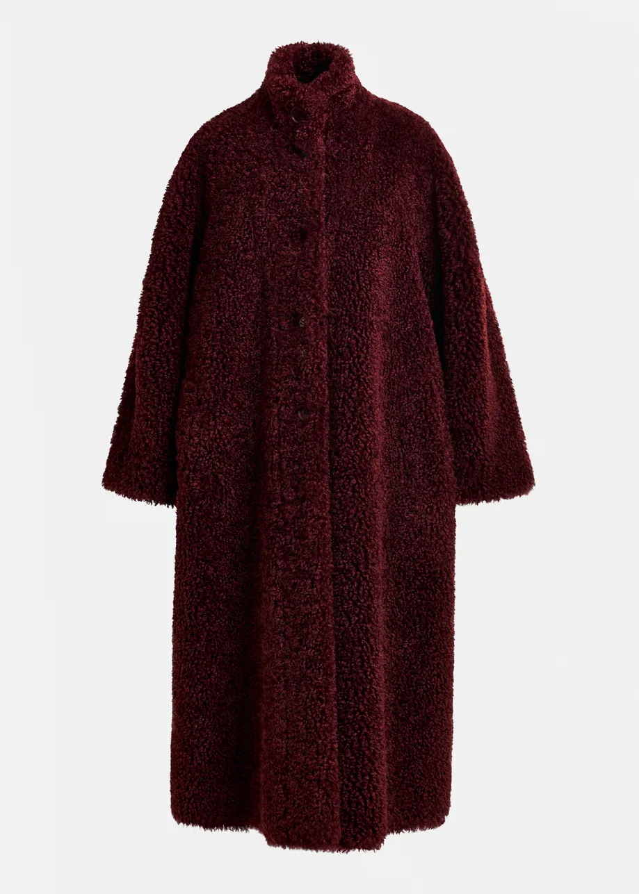 Burgundy oversized faux shearling coat with stand-up collar
