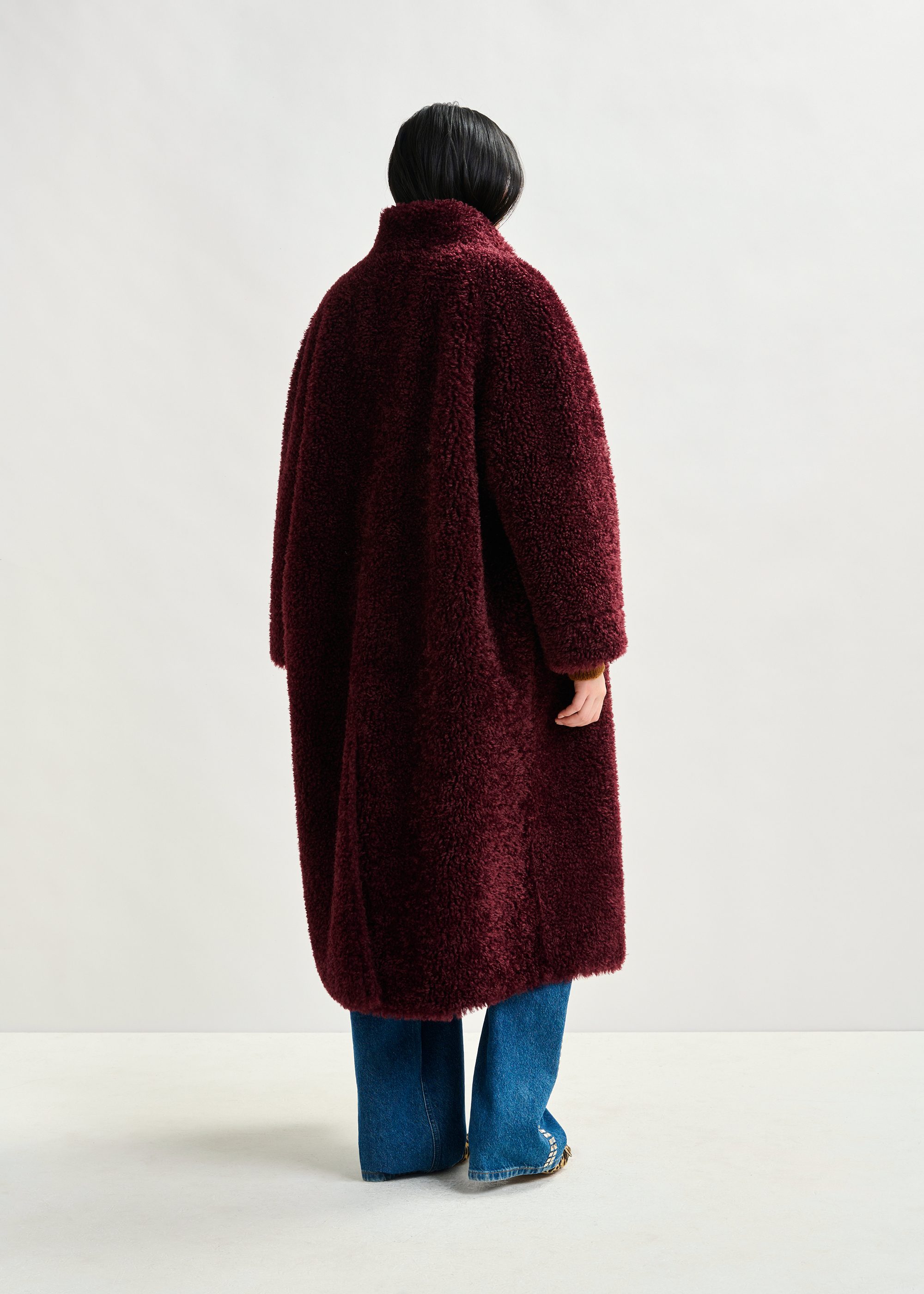 Burgundy oversized faux shearling coat with stand-up collar