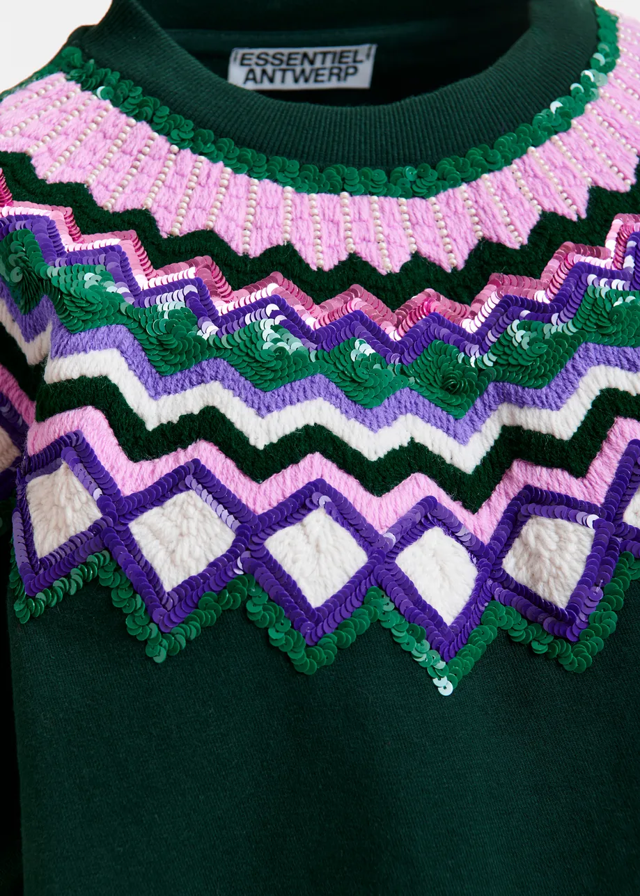 Donkergroene sweater met veelkleurige pailletten