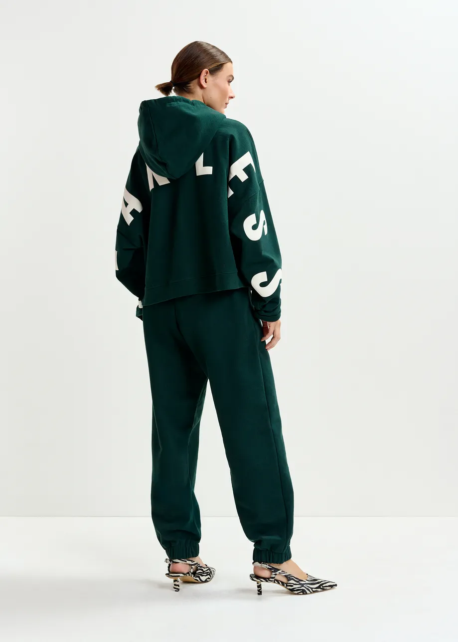 Kaki en witte oversized hoodie met 'fearless'-print