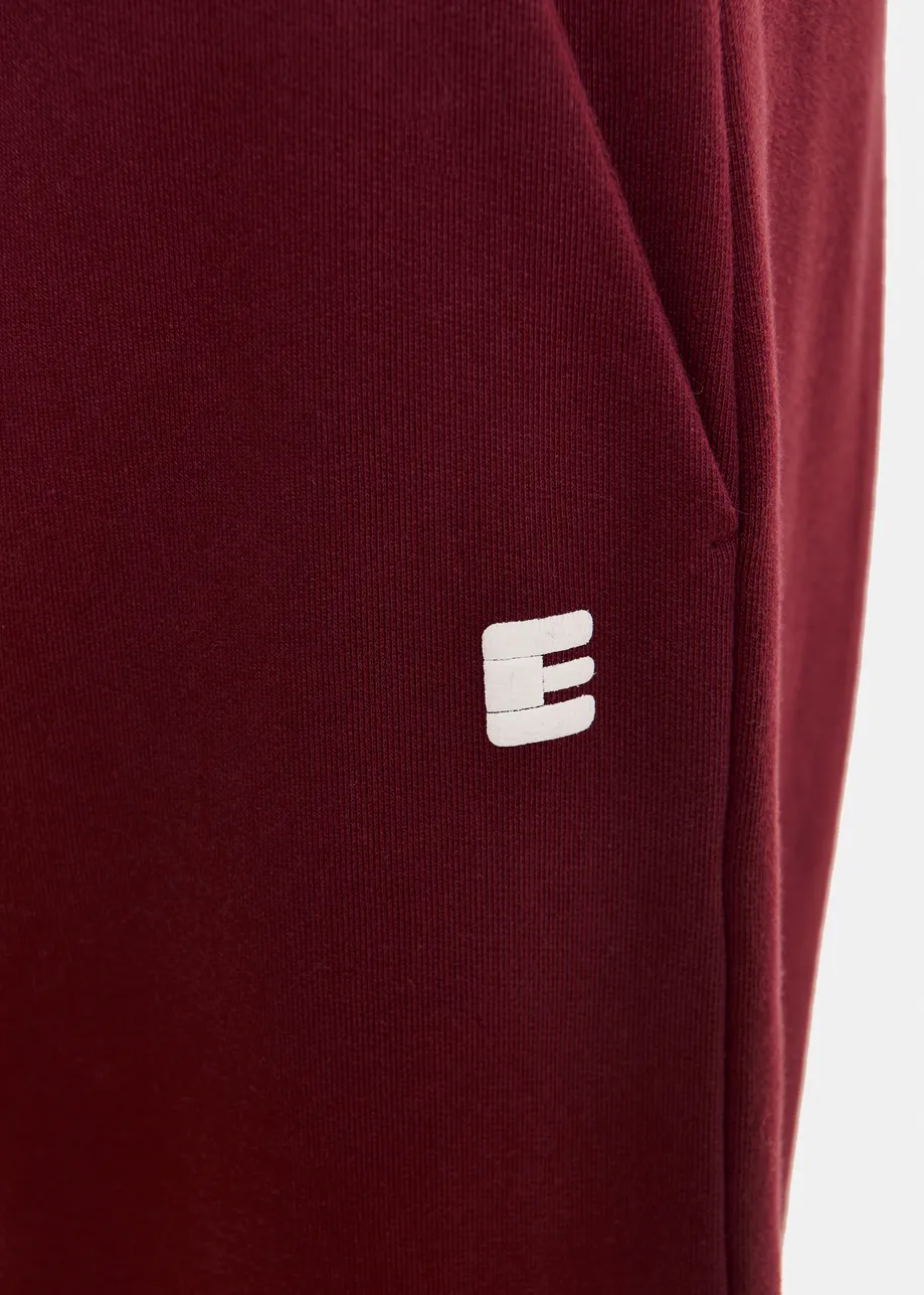 Burgundy cotton sweatpants with E-shaped embroidery