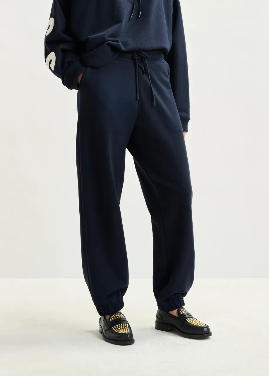 Navy cotton sweatpants with E-shaped embroidery