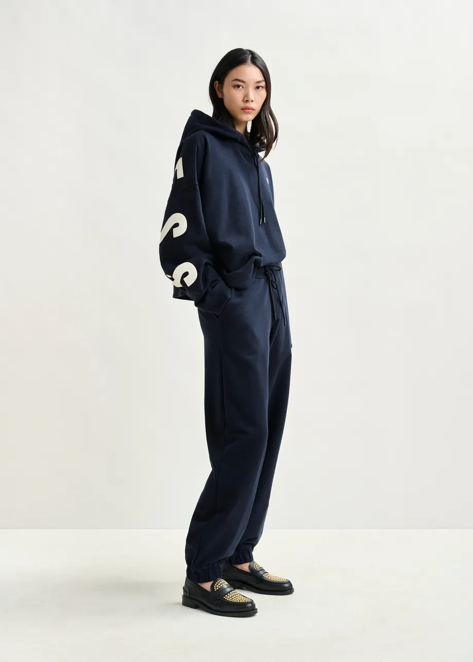 Navy cotton sweatpants with E-shaped embroidery