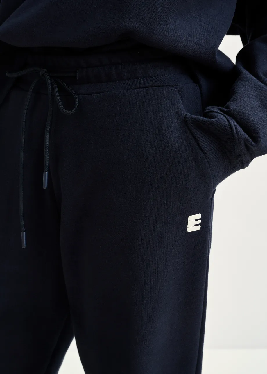 Navy cotton sweatpants with E-shaped embroidery