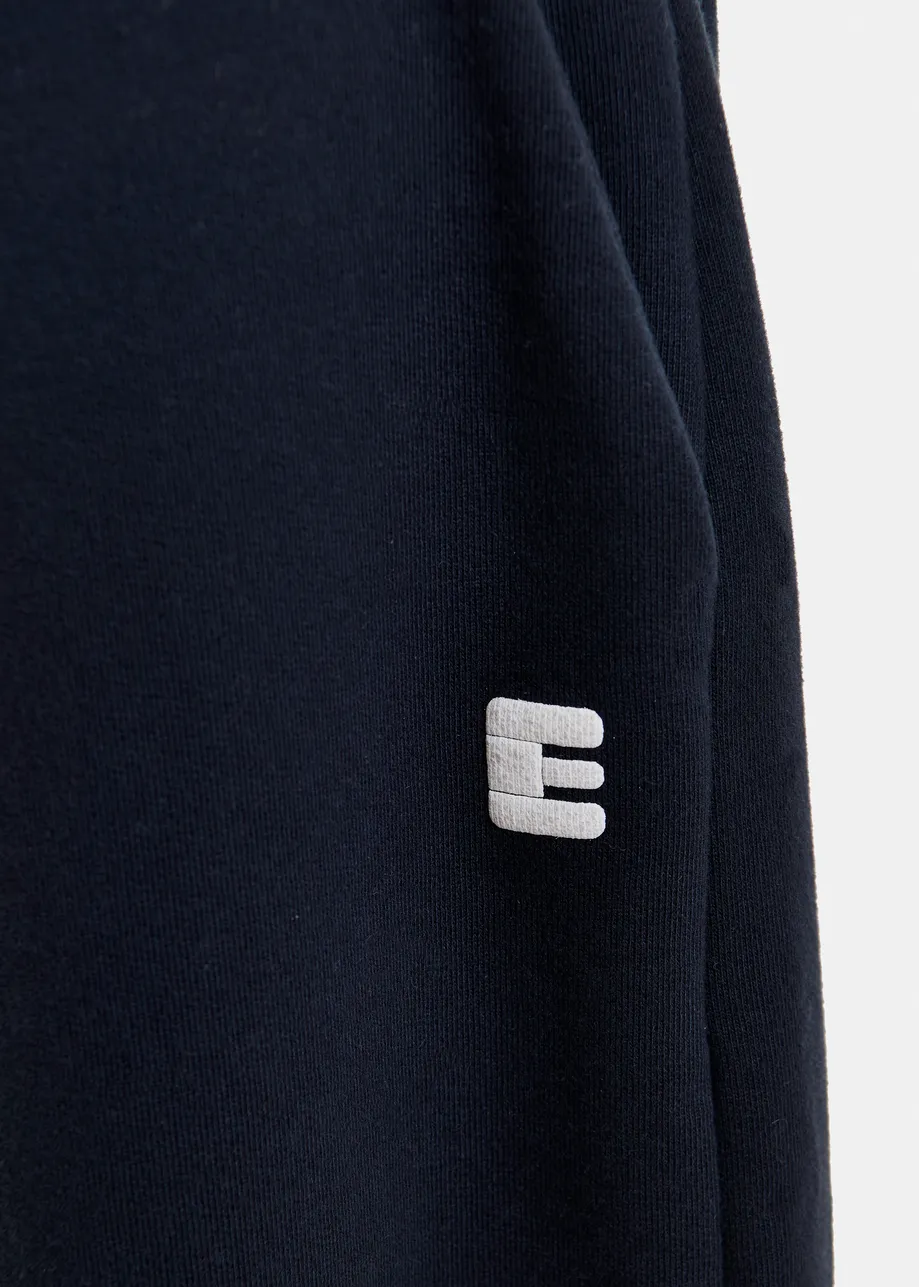Navy cotton sweatpants with E-shaped embroidery