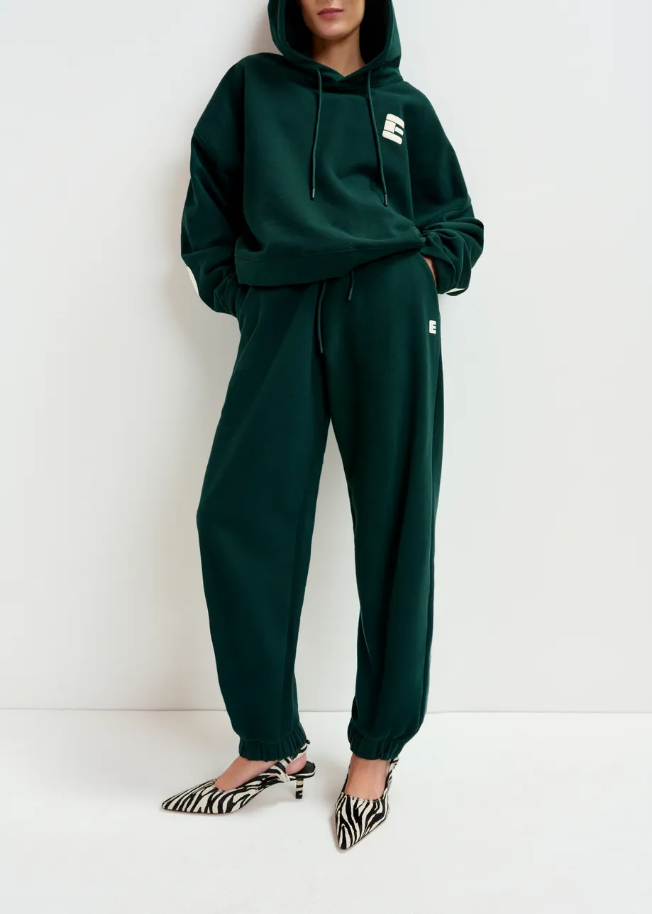 Dark green cotton sweatpants with E-shaped embroidery