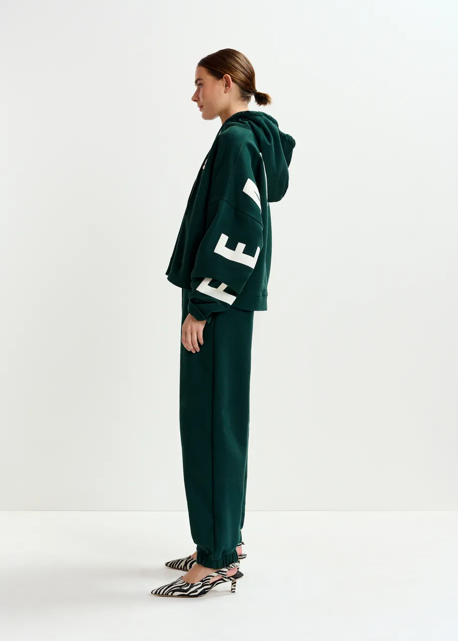 Dark green cotton sweatpants with E-shaped embroidery