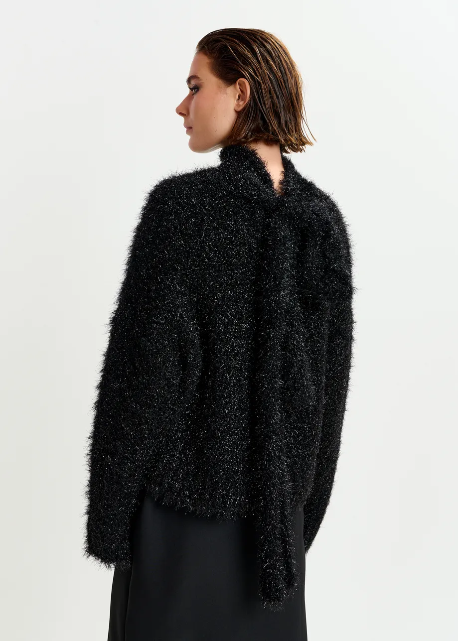 Black metallic mock-neck sweater with pussy-bow tie