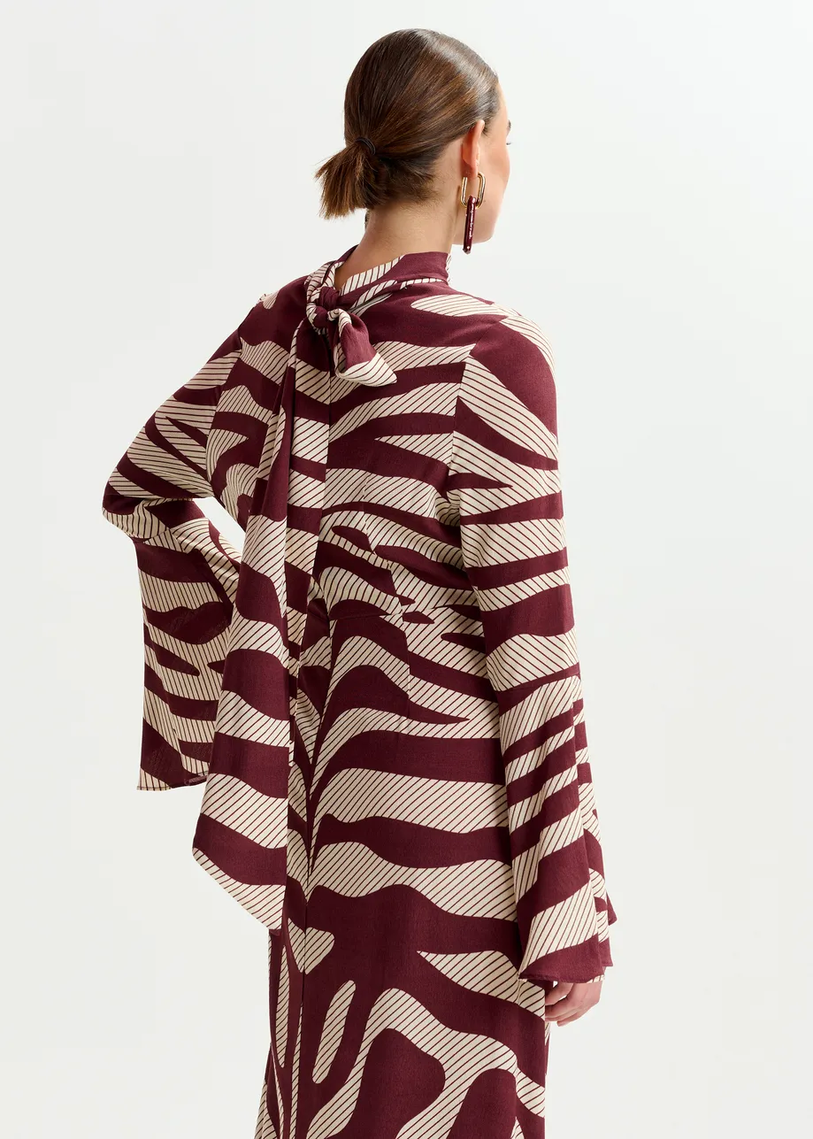 Off-white and burgundy asymmetric zebra-print maxi dress with pussy bow tie