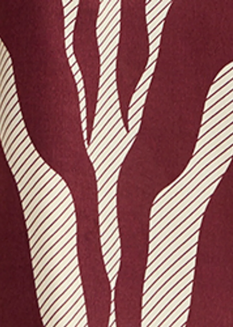 Gebroken witte en bordeaux asymmetrische zebraprint maxi-jurk met strik