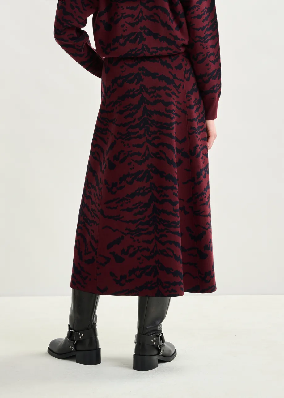 Burgundy and black zebra-print A-line knit midi skirt