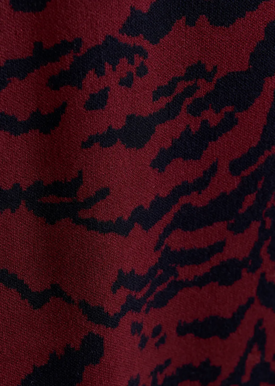Burgundy and black zebra-print A-line knit midi skirt
