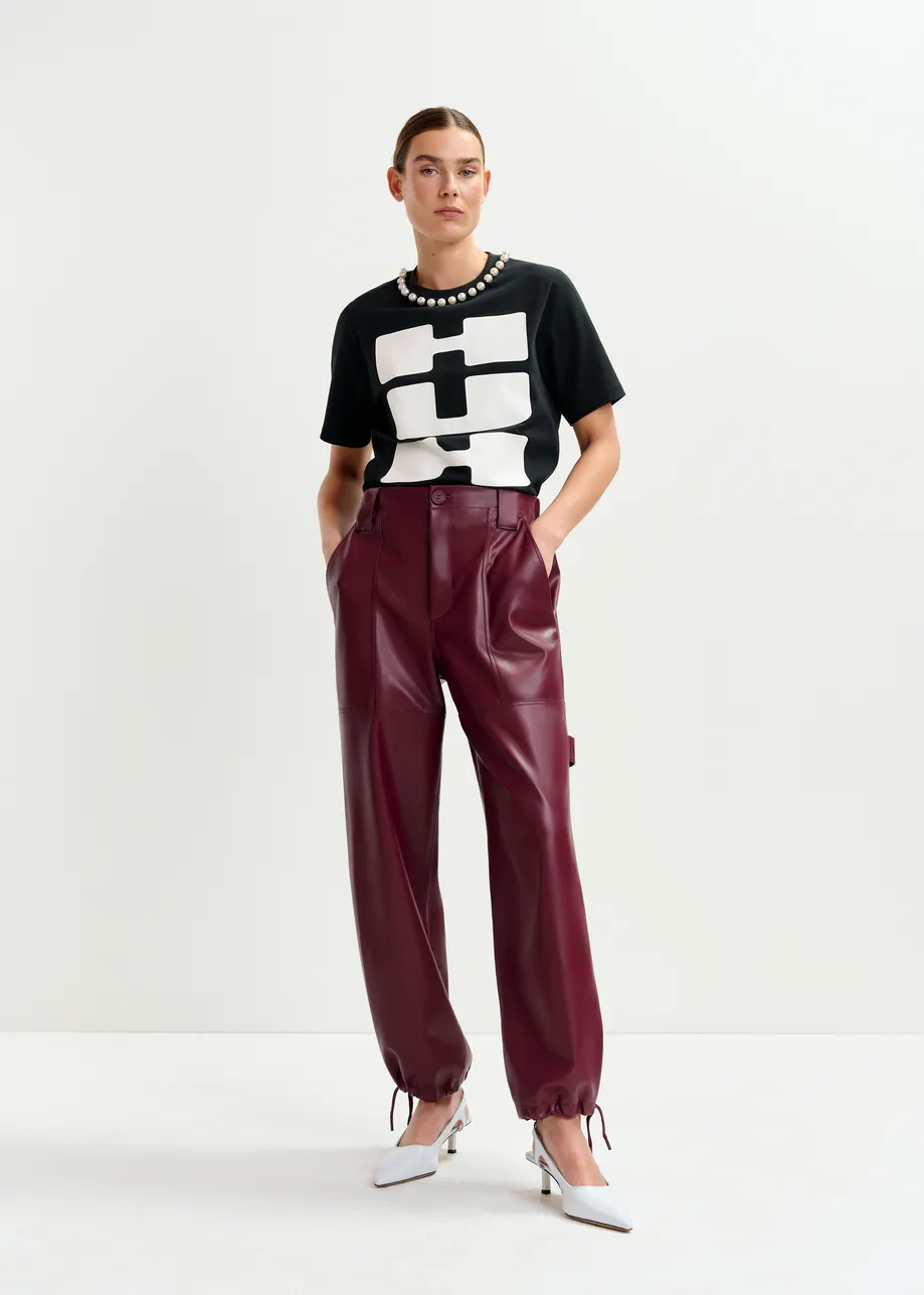 Burgundy faux leather tapered cargo pants