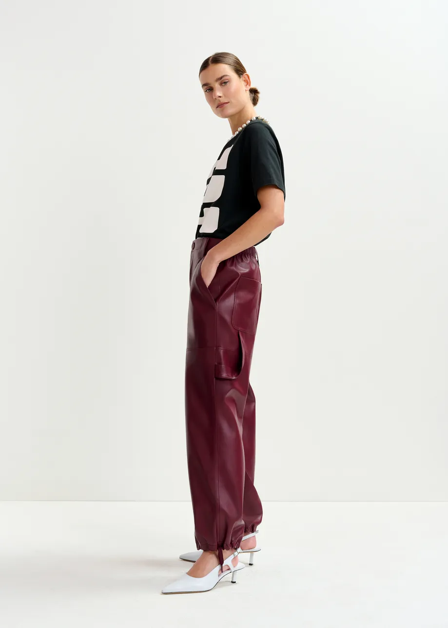 Burgundy faux leather tapered cargo pants