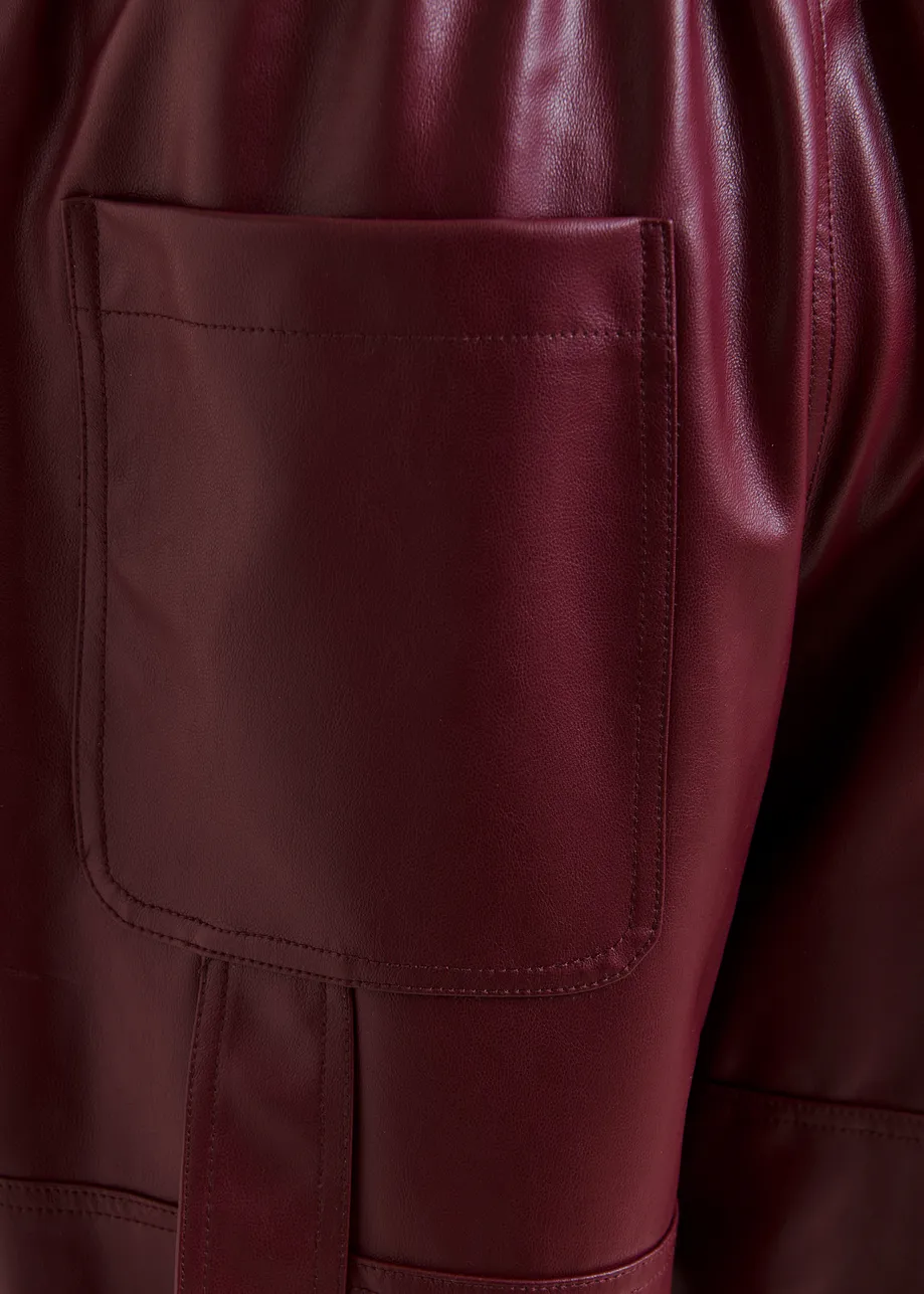 Burgundy faux leather tapered cargo pants